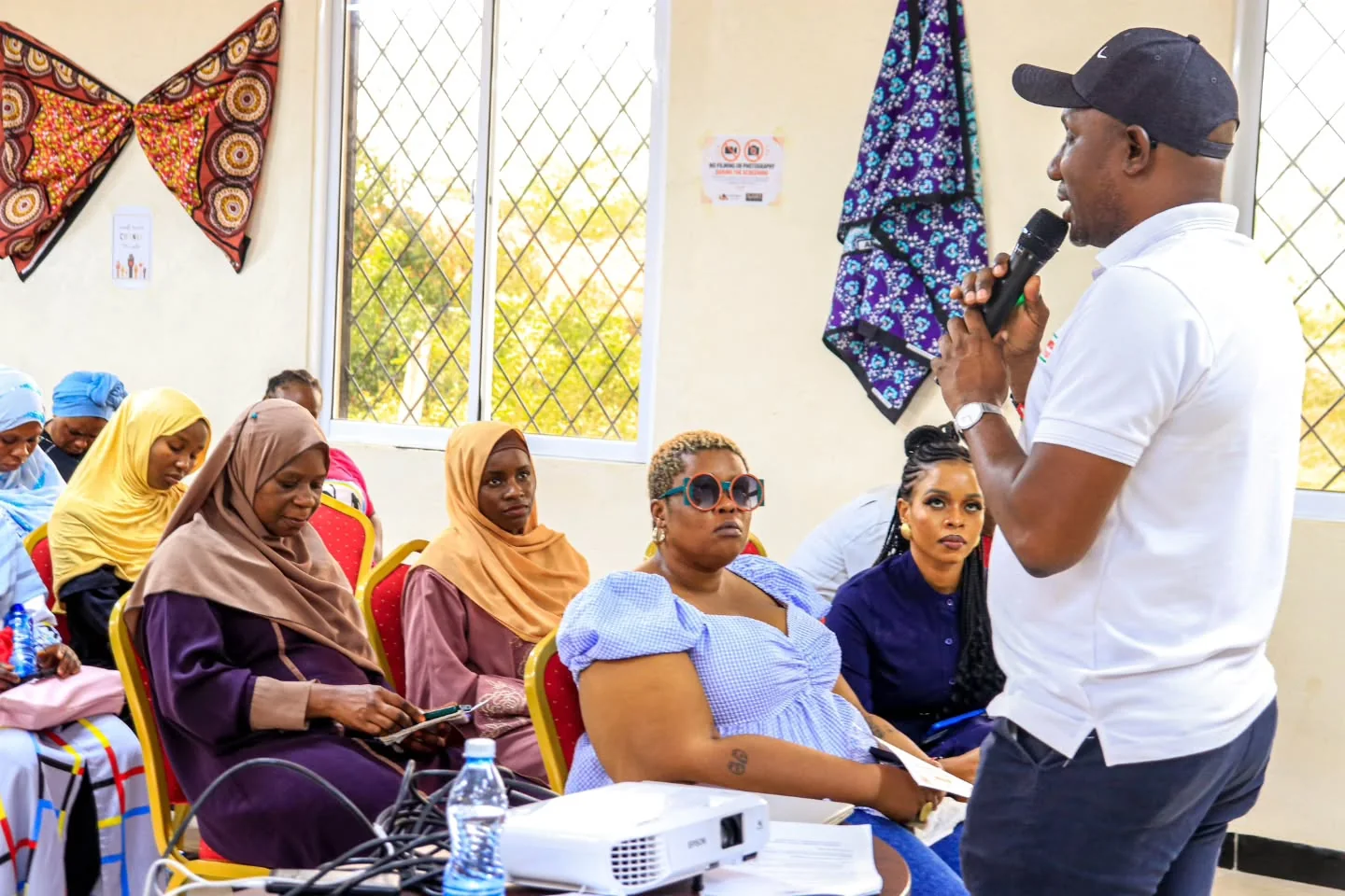 A speaker addresses participants during the Amka Nawi launch conversation.