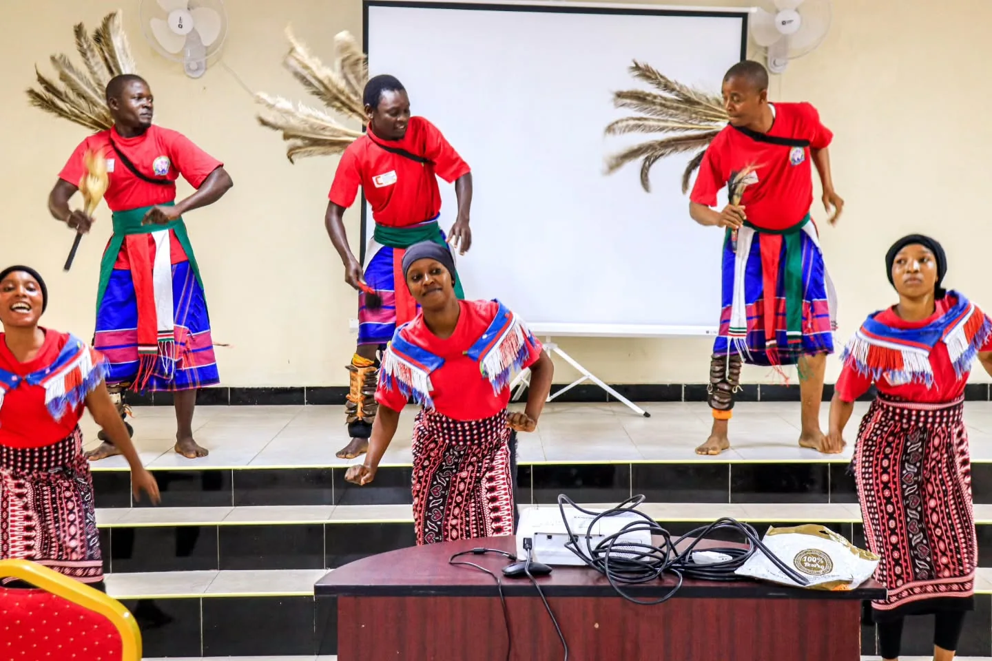 Performers share music and movement at the Amka Nawi launch gathering.